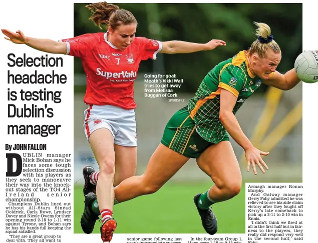 ?? SPORTSFILE ?? Going for goal: Meath’s Vikki Wall tries to get away from Melisaa Duggan of Cork