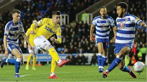  ?? REX ?? Turn and fire: Pablo Hernandez rattles in his first and Leeds’ second as the visitors demolish Reading