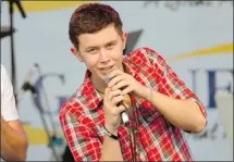  ?? Postmedia News Archive ?? American Idol winner Scotty Mccreery, who never had the show’s eliminatio­n song played for him, recorded this season’s exit tune.