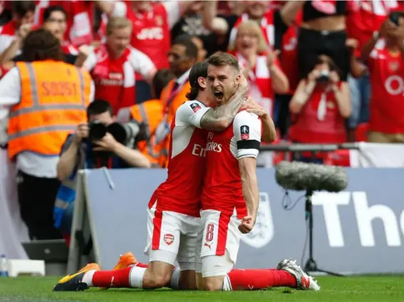  ??  ?? Aaron Ramsey hit back shortly after Diego Costa's equaliser to restore Arsenal's lead (Getty)