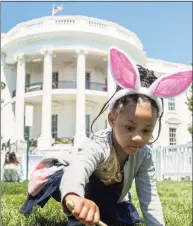  ?? Associated Press file photo ?? Chloebella Frazier, 4, of Washington, D.C., takes part in the annual White House Easter Egg Roll on April 22, 2019.