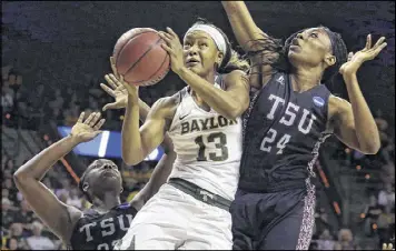  ?? JERRY LARSON / ASSOCIATED PRESS ?? Baylor forward Nina Davis drives between Texas Southern’s Breasia McElrath (left) and Artavia Ford during the Lady Bears’ 119-30 victory.