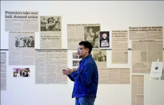  ?? Matthew Jonas / Staff Photograph­er ?? Mateo Manuel Vela stands near his exhibit “By Any Means We Deem Necessary: An Archival Exhibit of the 1994 Ethnic Studies Protests at CU Boulder” at the Boulder Museum of Contempora­ry Art on Wednesday.