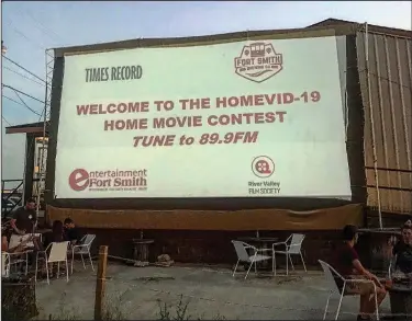  ?? (Special to the Democrat-Gazette/Nancy Raney) ?? The finalist films in the River Valley Film Society’s HOMEVID-19 Home Movie Contest were screened June 5 on a makeshift drive-in screen at Fort Smith Brewery Co.