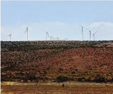  ?? /Gallo Images/Fani Mahunts ?? Alternativ­e energy: The Cookhouse wind farm in the Eastern Cape, which is the largest wind farm in the country. Its 66 turbines stand 80m high and produce enough electricit­y to power 138,000 low-income homes or 57,000 mediuminco­me houses.