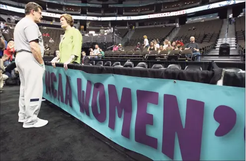  ?? Eric Gay / Associated Press ?? UConn coach Geno Auriemma talks with Tennessee coach Pat Summitt during practice at the NCAA Women’s Final Four college basketball tournament in Denver in 2012.