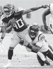  ?? Brett Coomer / Staff photograph­er ?? Texans safety Justin Reid (20) is on the COVID-19 list and isn’t expected to play against the Titans.