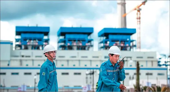  ?? VERI SANOVRI / XINHUA ?? Workers conduct operations at an alumina smelter plant of PT Well Harvest Winning Alumina Refinery, a joint venture in Indonesia in which China Hongqiao Group Co holds a majority stake.