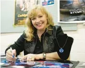  ?? ?? Morgan, star of “Tron” and “Caddyshack,” signs autographs for fans at the Great Allentown Comic Con in Allentown, Pennsylvan­ia, in 2012.