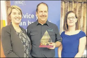  ??  ?? Small Business Innovation Award – Ditch Doctor Sara Boss, representi­ng award sponsor RBC, Adam Fisher of Ditch Doctor of Glenholme and chamber president Joanne Mcrae.