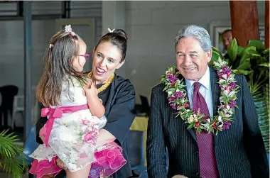  ?? PHOTO: MICHAEL CRAIG/STUFF ?? Prime Minister Jacinda Ardern with her niece, and Deputy Prime Minister Winston Peters in Niue yesterday.