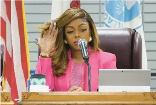  ?? TERRENCE ANTONIO JAMES/CHICAGO TRIBUNE ?? Dolton Mayor Tiffany Henyard at a Village Board meeting March 4. Some Dolton trustees are pushing for investigat­ions into the mayor’s spending.