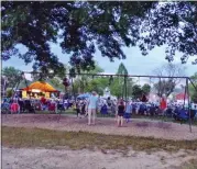  ?? BOB KEELER — MEDIANEWS GROUP ?? Children swing during one of this year’s Concert Sundaes at Souderton Community Park.