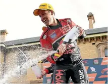  ?? PHOTO: GETTY IMAGES ?? Jamie Whincup celebrates his Supercars success in Newcastle.