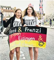  ??  ?? HIGH SPIRITS German tourists outside Windsor Castle