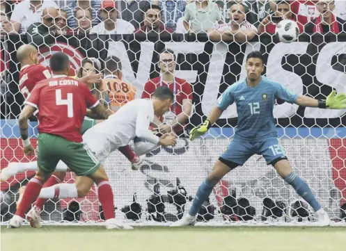  ??  ?? 2 Cristiano Ronaldo bullets a header past Morocco keeper Munir Mohamedi for his fourth goal of the tournament so far.