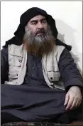  ?? AL-FURQAN MEDIA ?? A file image made from video posted on a militant website purports to show Abu Bakr al-Baghdadi, the leader of the Islamic State group.
