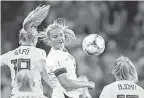  ?? MICHAEL CHOW/USA TODAY SPORTS ?? The USA’s Lindsey Horan and Sweden’s Fridolina Rolfo go up for a header Thursday.