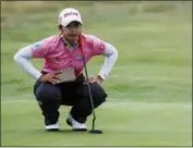  ?? PETER BYRNE — PA VIA AP ?? Thailand’s Pornanong Phatlum plays the 15th hole during the second round of the Women’s British Open at Royal Lytham &amp; St Annes Golf Club in Lytham, England, Friday.