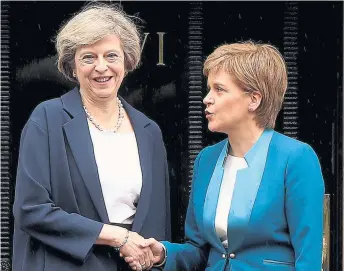  ?? Photograph: Gordon Terris ?? Playing chicken: Nicola Sturgeon and Theresa May