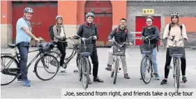  ??  ?? Joe, second from right, and friends take a cycle tour