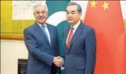  ?? AFP ?? China’s foriegn minister Wang Yi with his Pakistani counterpar­t Khawaja Asif in Beijing.