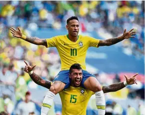  ??  ?? Double trouble: Brazil’s Neymar (top) celebratin­g with Paulinho after scoring the opening goal during the last-16 match against Mexico at the Samara Arena on Monday. — AFP