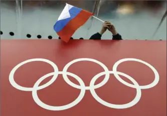  ?? DAVID J. PHILLIP, THE ASSOCIATED PRESS FILE PHOTO ?? The IOC said the individual sport federation­s would have to apply their own rules if they want to ban an entire Russian team from their events in Rio starting Aug. 5, as the IAAF has already done for track and field.