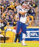  ?? JARED WICKERHAM/ASSOCIATED PRESS ?? New England tight end Rob Gronkowski is likely to be out eight weeks or more with a back injury. He has 25 catches this season.