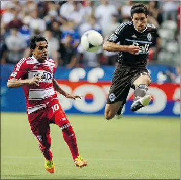  ?? JEFF VINNICK/ GETTY IMAGES FILES ?? There’s a good chance Whitecaps midfielder John Thorringto­n, shown leaping to get the ball against David Ferreira of FC Dallas on Aug. 15, will start tonight for only the second time since July 4.