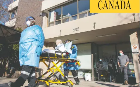  ?? FRANK GUNN/THE CANADIAN PRESS ?? A resident is taken to a waiting ambulance as nurses and support workers at the St. George Care Community in Toronto watch on Thursday.
As the pandemic worsens, most Canadians say they'd support stricter lockdowns and stiff fines for rule-breakers, a new poll says.