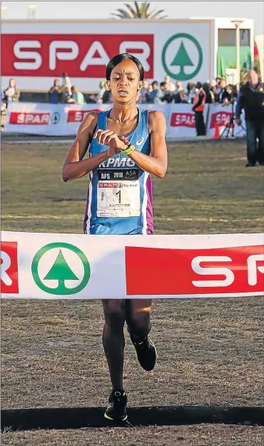  ?? Picture: WERNER HILLS ?? ON A ROLL: Defending champion Kesa Molotsane crosses the line to win her second straight title in the Port Elizabeth leg of the SPAR Women’s 10km Challenge at Pollok Beach on Saturday