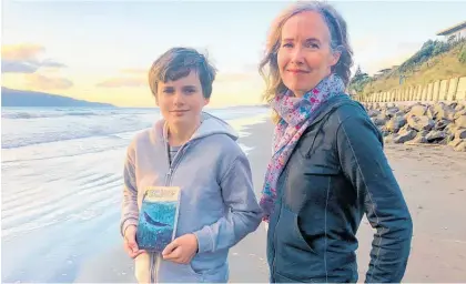  ?? ?? Arlo and Vida Kelly with Echo, Arlo’s first profession­ally published novel.