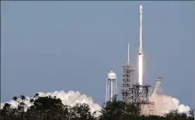  ?? ASSOCIATED PRESS FILE PHOTO ?? A Falcon 9 SpaceX rocket carrying a Koreasat 5A communicat­ions satellite lifts off at the Kennedy Space Center in Cape Canaveral, Fla., on Oct. 30.