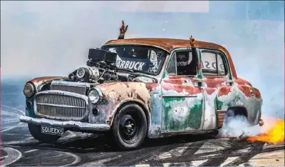  ??  ?? RIGHT: With the skyrocketi­ng prices of classic Aussie, American and even Japanese tin, Geelong’s David Alford thought laterally and snagged a 1954 Hillman Minx to build into his burnout chariot. Packing a methanol-guzzling, 6/71-blown LS1, SQUEEKS finished 28th in Elite