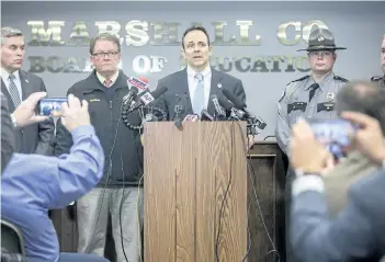  ?? RYAN HERMENS/THE ASSOCIATED PRESS ?? Gov. Matt Bevin speaks during a news conference at the Marshall County Board of Education following a shooting at Marshall County High School in Benton, Ky., that left one person dead and at least nine others wounded. A suspect was arrested at the...