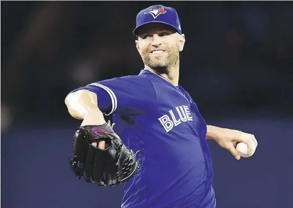  ?? FRANK GUNN/THE CANADIAN PRESS ?? Toronto Blue Jays starting pitcher J.A. Happ allowed just five hits while striking out nine in five innings of work against the Baltimore Orioles Sunday in what might have been his Blue Jays swan song at Rogers Centre.