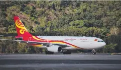  ??  ?? WELCOME: The first Hainan Airlines flight from Shenzhen.