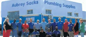  ??  ?? Aubrey Sacks Plumbing Supplies staff celebrate 25 years in the business