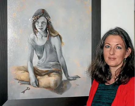  ?? PHOTO: ADAM POULOPOULO­S ?? Soraya Bradley with her painting ‘The Keeper’ which was best in show at the Kapiti Rotary Art Show.
