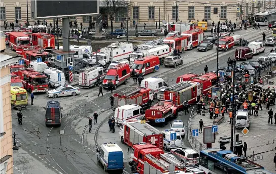  ?? PHOTO: REUTERS ?? Emergency services vehicles jam a road intersecti­on outside the Sennaya Ploshchad metro station, following explosions in two train carriages in St. Petersburg.