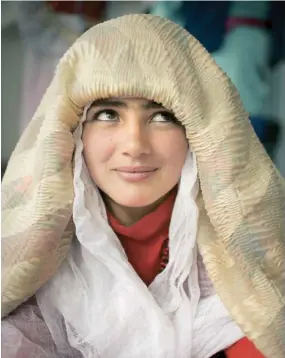  ??  ?? KHOROG, TAJIKISTAN
A Pamiri bride in Khorog, Tajikistan, by Matthieu Paley, December 2010/ January 2011