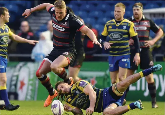  ??  ?? JUMP TO IT: Edinburgh’s Duhan van der Merwe manages to evade Josh Navidi but Cardiff Blues had the last laugh with quarter-final victory at Murrayfiel­d last night