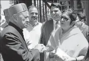  ?? DEEPAK SANSTA/HT ?? All India Congress Committee incharge for party affairs in Himachal, Rajni Patil, with former chief minister Virbhadra Singh in Shimla on Tuesday.