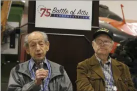  ?? MARK THIESSEN — THE ASSOCIATED PRESS ?? World War II veterans Allan Seroll, left, of Massachuse­tts, and William Roy Dover, right, of Alabama, right, attend a 75th anniversar­y celebratio­n of the Battle of Attu in Anchorage, Alaska. Dover was an American soldier who took part in the May 1943...