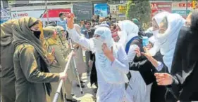  ?? HT FILE/WASEEM ANDRABI ?? Kashmiri students shout slogans during a protest at Lal Chowk, Srinagar.