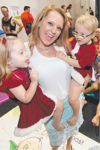  ??  ?? Kristie Miller with her twins Chanel and Tyson at yesterday’s party. Pictures: MIKE BATTERHAM