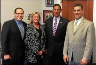  ?? Trentonian Photo/SHERRINA V. NAVANI ?? From Left to Right Adam Perle, second vice president; Sharon Franz, president; Congressma­n Frank LoBiondo (R-NJ 2); and Dr. Brian Tyrrell, third vice president pause for a photo as they advocate for the tourism industry in Washington DC late last month.