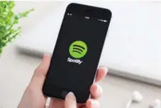  ?? DREAMSTIME ?? Spotify is experiment­ing with new media to increase the time customers spend with the app and to boost ad sales.