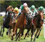  ?? PHOTO NYRA/ROBERT MAUHAR ?? Estrechada, outside left, came up from the outside of the field to claim Saturday’s running of the Fasig Tipton Waya Stakes at Saratoga Race Course.